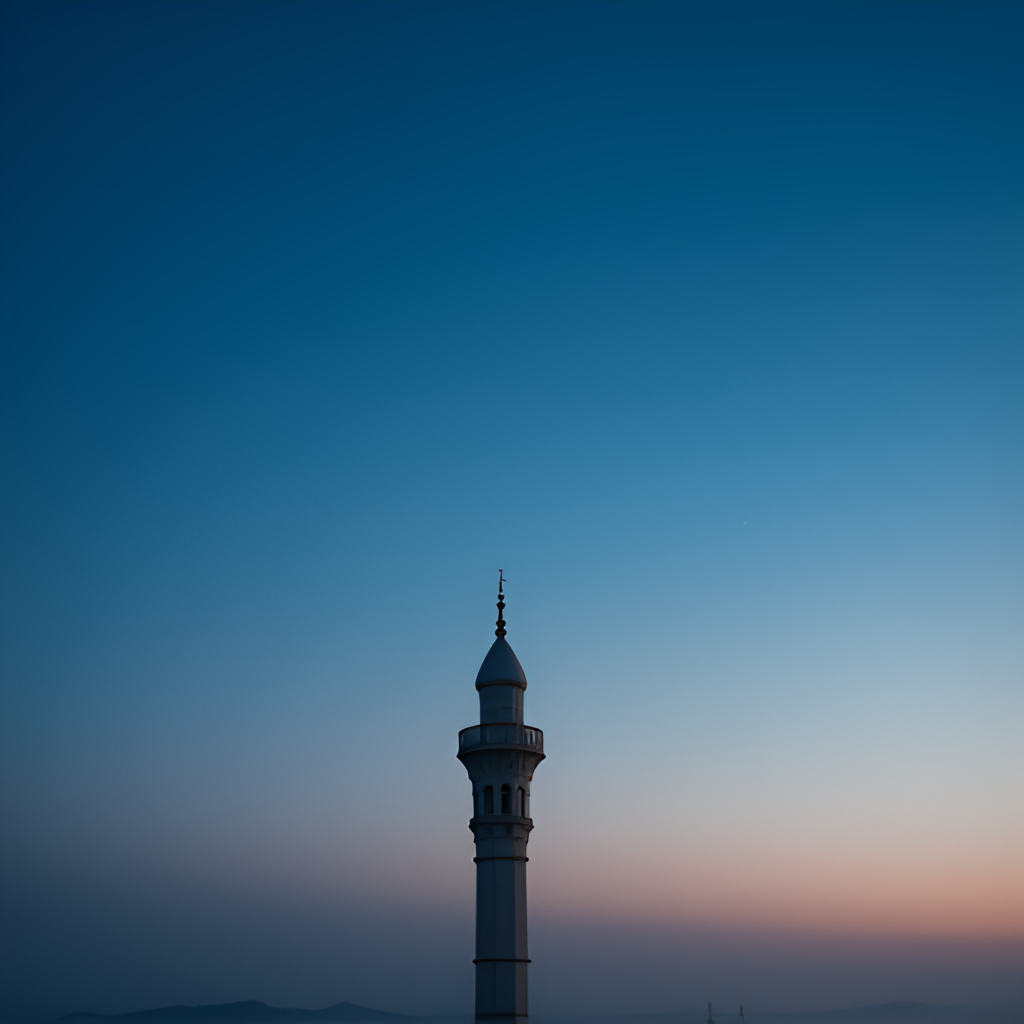 A serene image of a mosque minaret against a sky transitioning from dark blue to a soft pre-dawn light, with a few stars still visible. The mood is peaceful and spiritual.